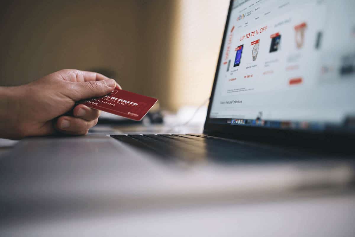 a man with a credit card trying to purchase online